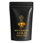 Black tea packaging with gold elephant design and 'Riverbeki Gold Assam Tea' text on a white background