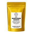 Mat golden tea packaging with label that reads "Highlander Reserve" from Riverbeki tea.